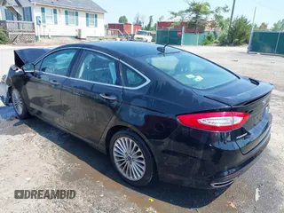 2016 Ford Fusion Titanium z VIN 3FA6P0K97GR174228, wystawiony jako IAAI lot #42636326 z przebiegiem 110 288 mil mil oraz . Historia ofert i sprzedaży dostępna na DreamBid. Obrazek 3.