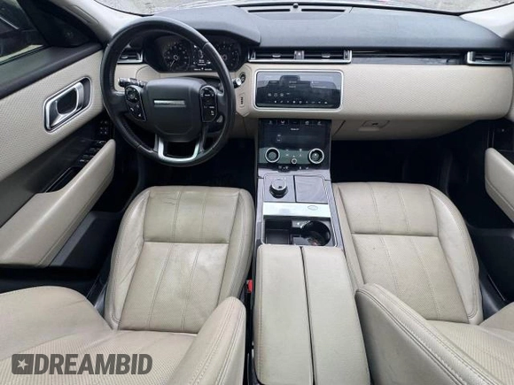 2018 Land Rover Range Rover Velar S с VIN SALYB2RX2JA711406, выставлен на аукционе Copart как лот 51550605 с пробегом 100 621 миль миль и Чистый • Clean title. История ставок и продаж доступна на DreamBid. Изображение 9.