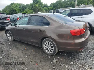 2013 Volkswagen Jetta SE with VIN 3VWDP7AJ8DM431330, listed as a Copart auction lot 56738795 with 114,151 mi miles and Salvage title. Bid and sale history available at DreamBid. Image 2.