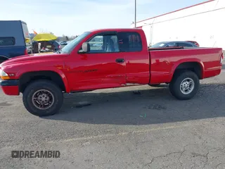 1999 Dodge Dakota SLT with VIN 1B7GG22XXXS290116, listed as a IAAI auction lot 41372636 with 132,112 mi miles and . Bid and sale history available at carsss.com. Image 6.