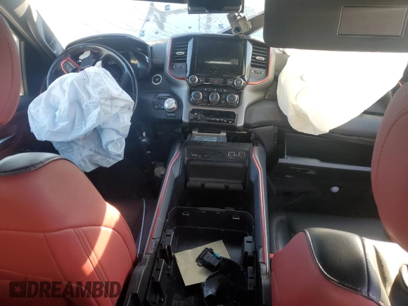 2019 Ram 1500 Rebel z VIN 1C6SRFLT8KN780527, wystawiony jako Copart lot #47611955 z przebiegiem Nie podano mil oraz Szkoda całkowita • Salvage title. Historia ofert i sprzedaży dostępna na DreamBid. Obrazek 8.
