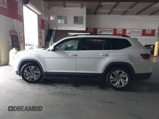 2021 Volkswagen Atlas 3.6L V6 SE w/Technology with VIN 1V2KR2CA8MC501445, listed as a IAAI auction lot 41798934 with 74,764 mi miles. Bid and sale history available at carsss.com. Image 13.