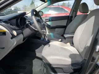 2010 Kia Forte EX z VIN KNAFU4A27A5260564, wystawiony jako Copart lot #55440345 z przebiegiem 169 444 mil mil oraz Szkoda całkowita • Salvage title. Historia ofert i sprzedaży dostępna na DreamBid. Obrazek 7.