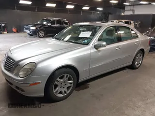 2006 Mercedes-Benz E-Class 3.5L with VIN WDBUF87J76X182677, listed as a IAAI auction lot 42016237 with 150,085 mi miles. Bid and sale history available at carsss.com. Image 2.