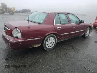 2005 Mercury Grand Marquis GS with VIN 2MEFM74W05X604628, listed as a Copart auction lot 51332335 with 165,224 mi miles and Salvage Title. Bid and sale history available at DreamBid. Image 3.