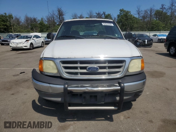 2004 Ford F-150 XL with VIN 2FTRX17W54CA63466, listed as a Copart auction lot 64022895 with 329,377 mi miles and Salvage title. Bid and sale history available at DreamBid. Image 5.