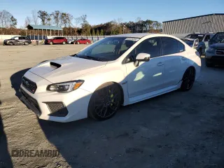 2019 Subaru WRX STI with VIN JF1VA2S68K9814059, listed as a Copart auction lot 82076004 with 72,761 mi miles and Salvage Title. Bid and sale history available at carsss.com. Image 1.