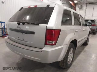 2007 Jeep Grand Cherokee Laredo with VIN 1J8GR48K57C687365, listed as a IAAI auction lot 42038456 with 162,343 mi miles. Bid and sale history available at carsss.com. Image 4.
