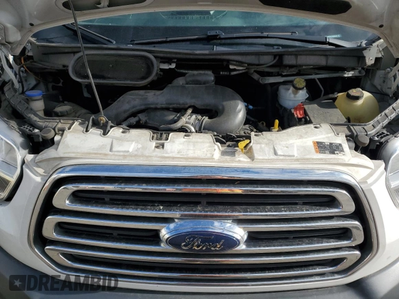 2018 Ford Transit with VIN 1FTYR1ZM1JKA58709, listed as a Copart auction lot 57285645 with 222,673 mi miles and Salvage title. Bid and sale history available at DreamBid. Image 12.