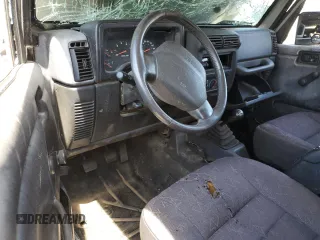 2002 Jeep Wrangler Sport with VIN 1J4FA49S42P720277, listed as a Copart auction lot 55856135 with Not provided miles and Salvage title. Bid and sale history available at DreamBid. Image 8.