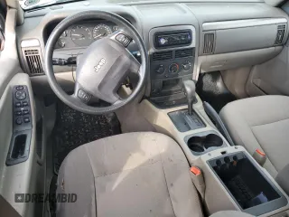 2004 Jeep Grand Cherokee Laredo z VIN 1J4GX48S24C348436, wystawiony jako Copart lot #61930385 z przebiegiem 97 536 mil mil oraz Szkoda całkowita • Salvage title. Historia ofert i sprzedaży dostępna na DreamBid. Obrazek 8.