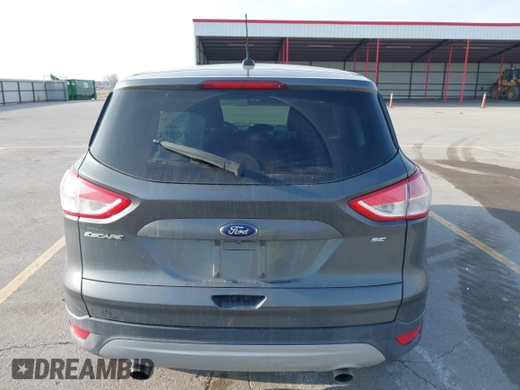 2015 Ford Escape SE with VIN 1FMCU0G73FUA77673, listed as a IAAI auction lot 41988290 with 176,734 mi miles. Bid and sale history available at carsss.com. Image 16.