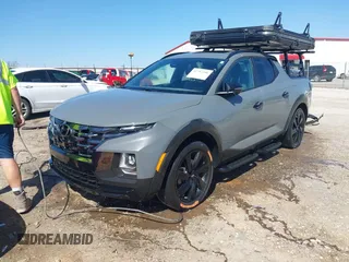 2023 Hyundai Santa Cruz Night Edition z VIN 5NTJCDAF1PH055092, wystawiony jako IAAI lot #41792396 z przebiegiem 46 253 mil mil oraz . Historia ofert i sprzedaży dostępna na DreamBid. Obrazek 2.