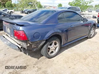 2002 Ford Mustang Standard with VIN 1FAFP40452F150630, listed as a IAAI auction lot 41987802 with 236,866 mi miles. Bid and sale history available at carsss.com. Image 4.