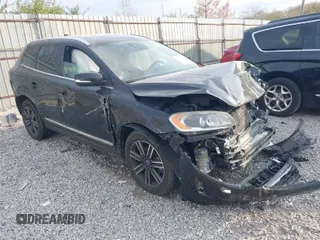 2016 Volvo XC60 T6 Drive-E Platinum z VIN YV449MRM8G2891302, wystawiony jako IAAI lot #40747214 z przebiegiem 153 357 mil mil oraz . Historia ofert i sprzedaży dostępna na DreamBid. Obrazek 1.