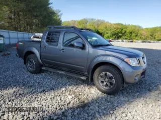 2016 Nissan Frontier Pro-4X with VIN 1N6AD0EVXGN702673, listed as a Copart auction lot 54716865 with 81,258 mi miles and Salvage title. Bid and sale history available at DreamBid. Image 4.