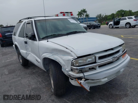 2003 Chevrolet Blazer Xtreme z VIN 1GNCS18X33K152868, wystawiony jako IAAI lot #39801584 z przebiegiem 167 157 mil mil oraz . Historia ofert i sprzedaży dostępna na DreamBid. Obrazek 6.