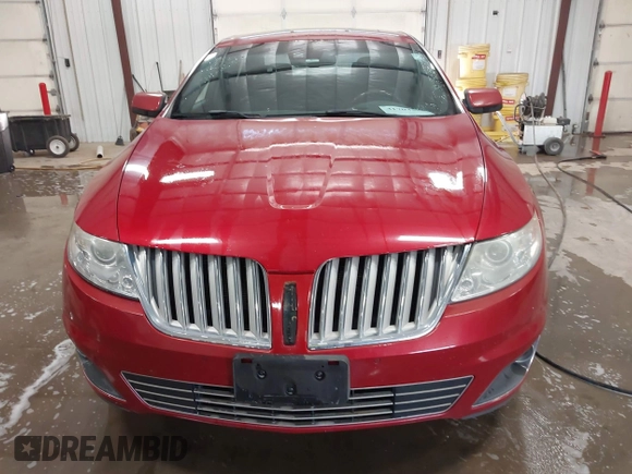 2009 Lincoln MKS with VIN 1LNHM94R59G610559, listed as a IAAI auction lot 41704552 with 168,556 mi miles. Bid and sale history available at carsss.com. Image 12.