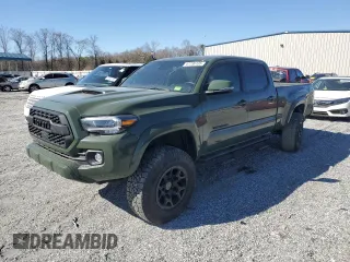 2021 Toyota Tacoma 4WD SR5 with VIN 3TMDZ5BN3MM111433, listed as a Copart auction lot 47736135 with 73,061 mi miles and Salvage Title. Bid and sale history available at carsss.com. Image 1.