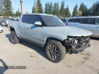 2022 Rivian R1T Adventure Package with VIN 7FCTGAAA5NN007018, listed as a IAAI auction lot 42018939 with 41,991 mi miles. Bid and sale history available at carsss.com. Image 1.