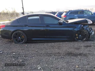2019 BMW M5 Competition z VIN WBSJF0C59KB448103, wystawiony jako IAAI lot #41962677 z przebiegiem 42 455 mil mil oraz . Historia ofert i sprzedaży dostępna na DreamBid. Obrazek 13.
