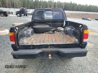 1999 Ford Ranger XL with VIN 1FTYR10C0XTA88744, listed as a Copart auction lot 44258415 with 202,709 mi miles and Salvage title. Bid and sale history available at DreamBid. Image 6.