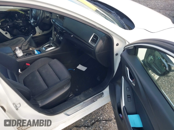 2014 Mazda 6 i Sport with VIN JM1GJ1U62E1116690, listed as a IAAI auction lot 42082188 with 144,137 mi miles and . Bid and sale history available at DreamBid. Image 5.