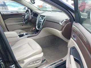 2016 Cadillac SRX Luxury Collection with VIN 3GYFNBE3XGS504059, listed as a IAAI auction lot 42306894 with 87,933 mi miles and . Bid and sale history available at DreamBid. Image 5.