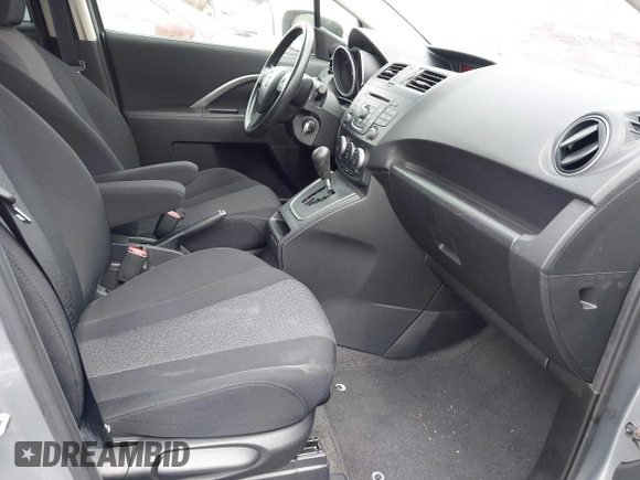 2012 Mazda 5 Sport z VIN JM1CW2BL6C0105662, wystawiony jako IAAI lot #42465711 z przebiegiem 67 534 mil mil oraz . Historia ofert i sprzedaży dostępna na DreamBid. Obrazek 5.