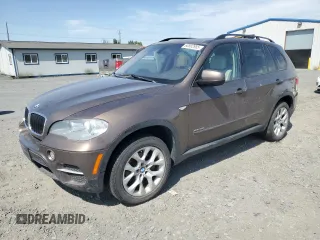 2012 BMW X5 35i z VIN 5UXZV4C53CL991686, wystawiony jako Copart lot #60562955 z przebiegiem 127 823 mil mil oraz Szkoda całkowita • Salvage title. Historia ofert i sprzedaży dostępna na DreamBid. Obrazek 1.