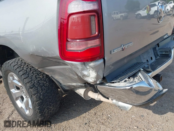 2019 Ram 1500 Big Horn z VIN 1C6RREFT6KN716958, wystawiony jako IAAI lot #41882909 z przebiegiem 119 991 mil mil oraz . Historia ofert i sprzedaży dostępna na DreamBid. Obrazek 6.