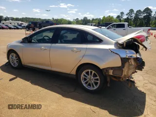 2017 Ford Focus SE with VIN 1FADP3F26HL295581, listed as a Copart auction lot 52158745 with 104,453 mi miles and Salvage title. Bid and sale history available at DreamBid. Image 2.
