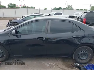 2015 Toyota Corolla L with VIN 5YFBURHE1FP212289, listed as a IAAI auction lot 42029067 with 147,377 mi miles and . Bid and sale history available at DreamBid. Image 14.