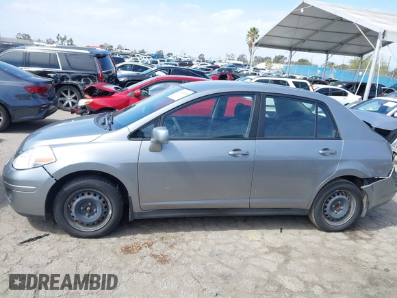 2011 Nissan Versa 1.8 S with VIN 3N1BC1AP0BL423655, listed as a IAAI auction lot 41816518 with 89,862 mi miles. Bid and sale history available at carsss.com. Image 14.