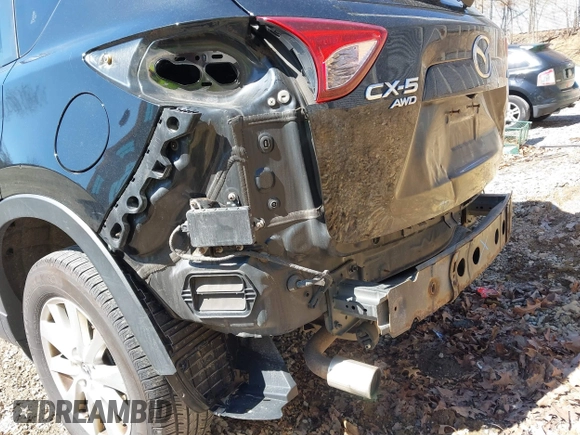 2014 Mazda CX-5 Touring with VIN JM3KE4CY8E0333029, listed as a IAAI auction lot 41857199 with 218,887 mi miles. Bid and sale history available at carsss.com. Image 17.