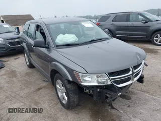 2013 Dodge Journey American Value with VIN 3C4PDCAB2DT645973, listed as a IAAI auction lot 42449402 with 133,000 mi miles and . Bid and sale history available at DreamBid. Image 1.