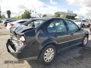 2004 Volkswagen Jetta GL z VIN 3VWRK69M54M092295, wystawiony jako Copart lot #47320195 z przebiegiem 161 593 mil mil oraz Szkoda całkowita • Salvage title. Historia ofert i sprzedaży dostępna na DreamBid. Obrazek 3.