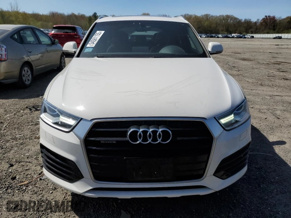 2018 Audi Q3 Premium with VIN WA1ECCFS7JR019255, listed as a Copart auction lot 54581155 with 76,923 mi miles and Salvage title. Bid and sale history available at DreamBid. Image 5.