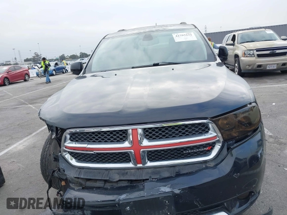 2012 Dodge Durango Crew with VIN 1C4SDHDT0CC321037, listed as a IAAI auction lot 42793232 with 162,593 mi miles and . Bid and sale history available at DreamBid. Image 13.