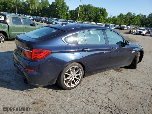 2012 BMW 5 Series Gran Turismo 550i xDrive with VIN WBASP4C54CC899853, listed as a Copart auction lot 62847714 with 141,034 mi miles and Salvage Title. Bid and sale history available at carsss.com. Image 3.