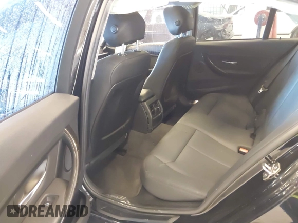 2015 BMW 3 Series 320i xDrive with VIN WBA3C3C56FK203031, listed as a IAAI auction lot 41012182 with 83,611 mi miles and . Bid and sale history available at DreamBid. Image 8.