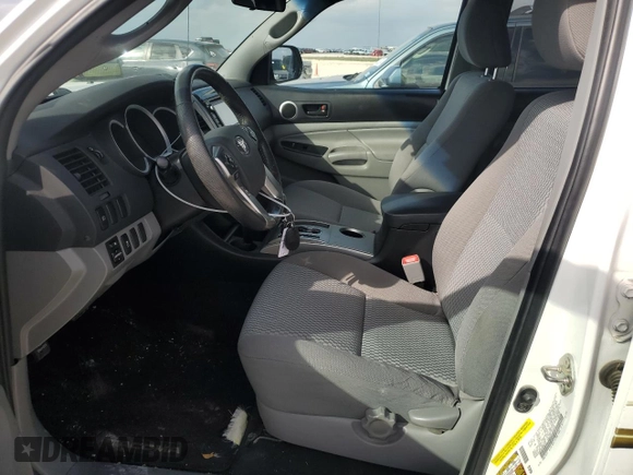 2014 Toyota Tacoma PreRunner with VIN 3TMKU4HN7EM040312, listed as a Copart auction lot 87420864 with 68,853 mi miles and Salvage title. Bid and sale history available at DreamBid. Image 7.
