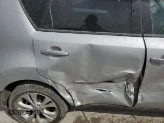 2014 Kia Soul + with VIN KNDJP3A51E7700667, listed as a Copart auction lot 48702635 with 74,301 mi miles and Salvage Title. Bid and sale history available at DreamBid. Image 11.