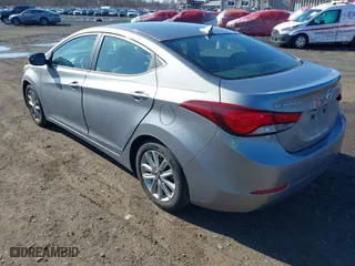 2014 Hyundai Elantra SE with VIN KMHDH4AEXEU049424, listed as a IAAI auction lot 41858569 with 77,496 mi miles. Bid and sale history available at carsss.com. Image 3.