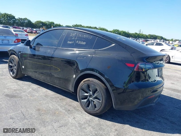 2024 Tesla Model Y with VIN 7SAYGDED2RA331436, listed as a IAAI auction lot 41713562 with NaN miles. Bid and sale history available at carsss.com. Image 3.