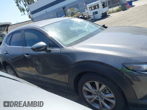 2021 Mazda CX-30 Select z VIN 3MVDMABL3MM233701, wystawiony jako IAAI lot #42086778 z przebiegiem Nie podano mil oraz . Historia ofert i sprzedaży dostępna na DreamBid. Obrazek 14.