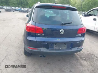 2015 Volkswagen Tiguan S z VIN WVGBV7AX8FW503114, wystawiony jako IAAI lot #42397033 z przebiegiem 200 658 mil mil oraz . Historia ofert i sprzedaży dostępna na DreamBid. Obrazek 16.