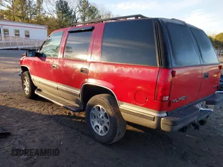 1999 GMC Yukon with VIN 1GKEK13R9XJ748190, listed as a IAAI auction lot 41317890 with 330,490 mi miles. Bid and sale history available at carsss.com. Image 3.