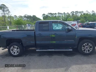 2017 Chevrolet Silverado 1500 LT with VIN 1GCRCREC4HZ298856, listed as a IAAI auction lot 42102225 with 147,501 mi miles and . Bid and sale history available at DreamBid. Image 13.