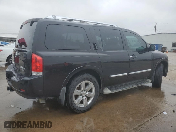 2014 Nissan Armada Platinum z VIN 5N1BA0NF5EN601168, wystawiony jako Copart lot #44590395 z przebiegiem Nie podano mil oraz Szkoda całkowita • Salvage title. Historia ofert i sprzedaży dostępna na DreamBid. Obrazek 3.